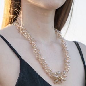 Collier de perles d'exil